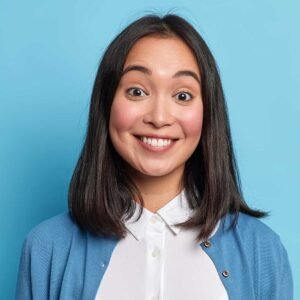 portrait of good looking brunette woman smiles too UCETKXG